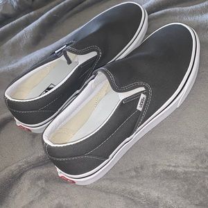 Never worn gray slip on Vans